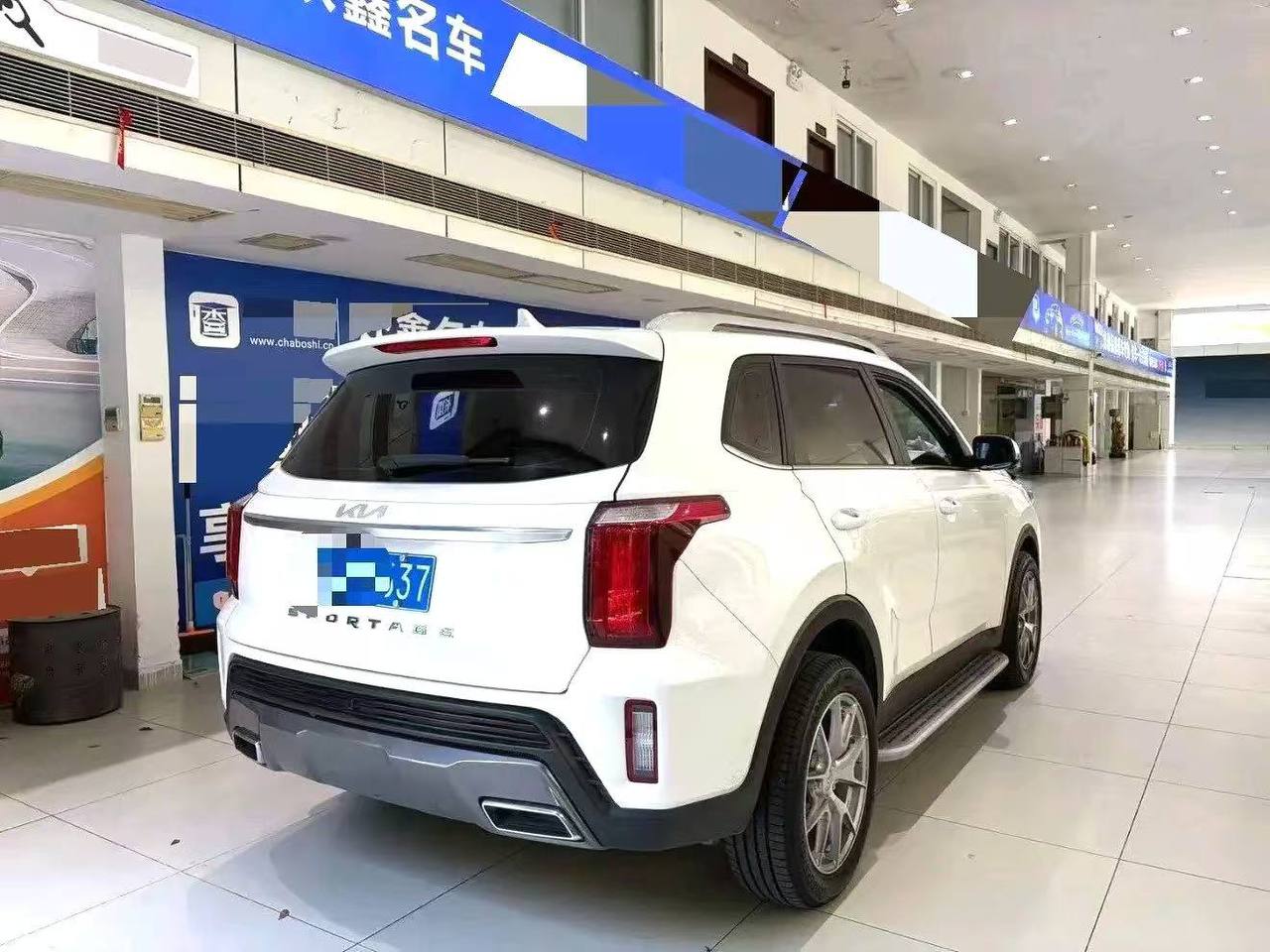 Kia Sportage Ace Brilliant — Вид сзади и сбоку